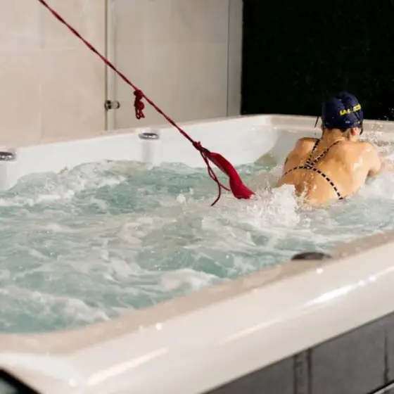 Swimmer in a Platinum Helios swim spa